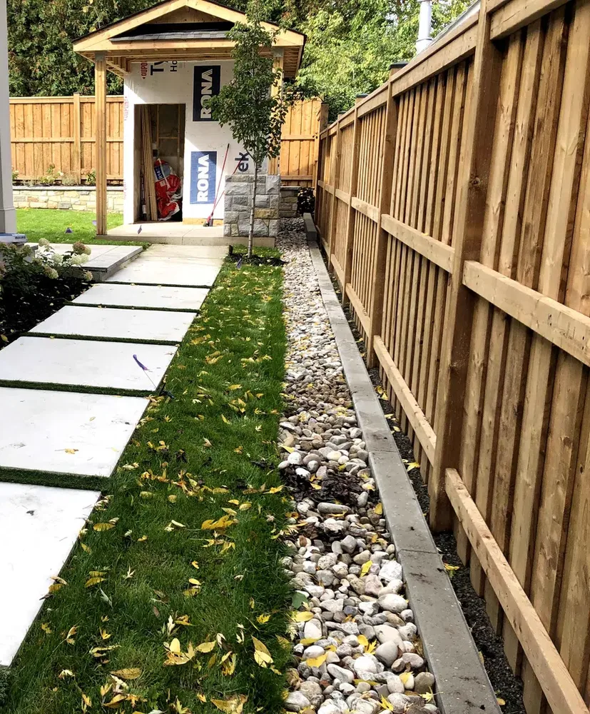 Finished wood privacy fence and walkway project