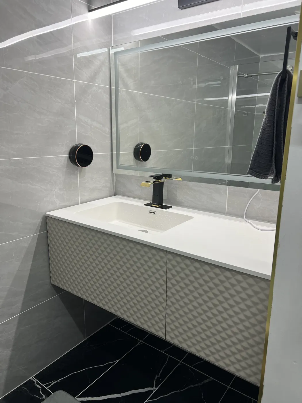 Bathroom tile and fixture renovation